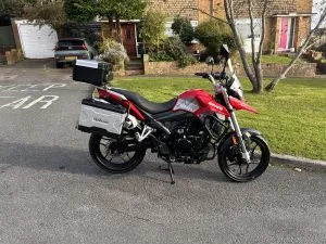 Photograph of sinnis terrain 125 motorcycle purchased in Staines-upon-Thames, Surrey