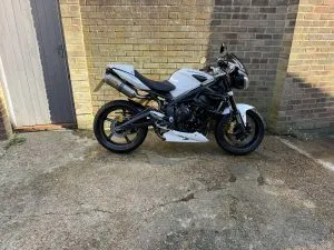 Photograph of triumph street triple motorcycle purchased in Lancing, Sussex